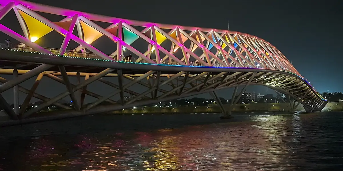 Atal Bridge lit up over the Sabarmati riverfront, Ahmedabad